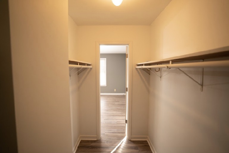 5026 Mt Zion Road Springfield, TN 37172 - Photo 14 of 18 a view of walk in closet with wooden floor