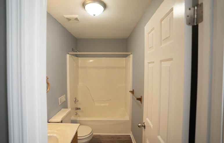 5026 Mt Zion Road Springfield, TN 37172 - Photo 16 of 18 a bathroom with a bathtub and a shower