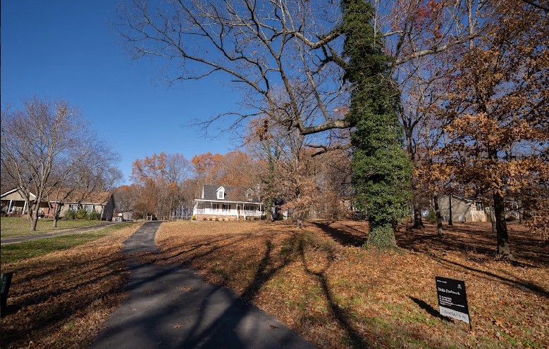 5026 Mt Zion Road Springfield, TN 37172 - Photo 2 of 18 a row of trees and cars parked on the side of street