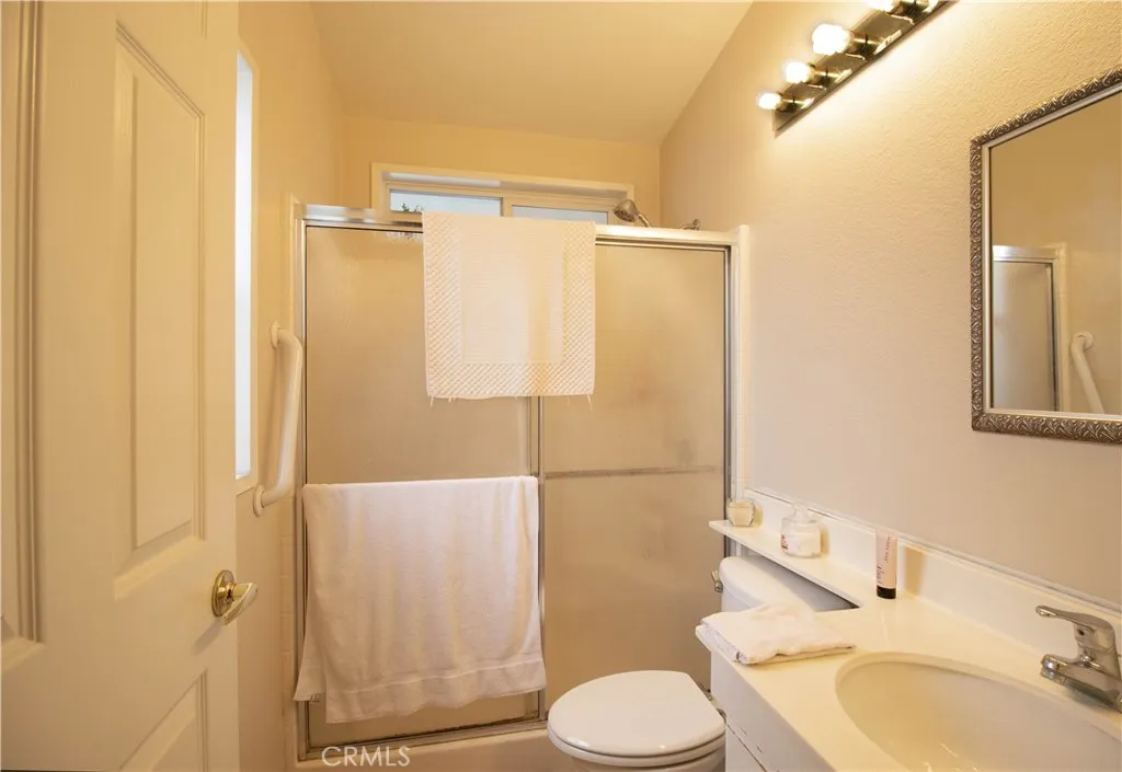 14352 Beach Westminster Ca, Unit 67 Westminster, CA 92683 - Photo 12 of 16 a bathroom with a sink toilet and shower