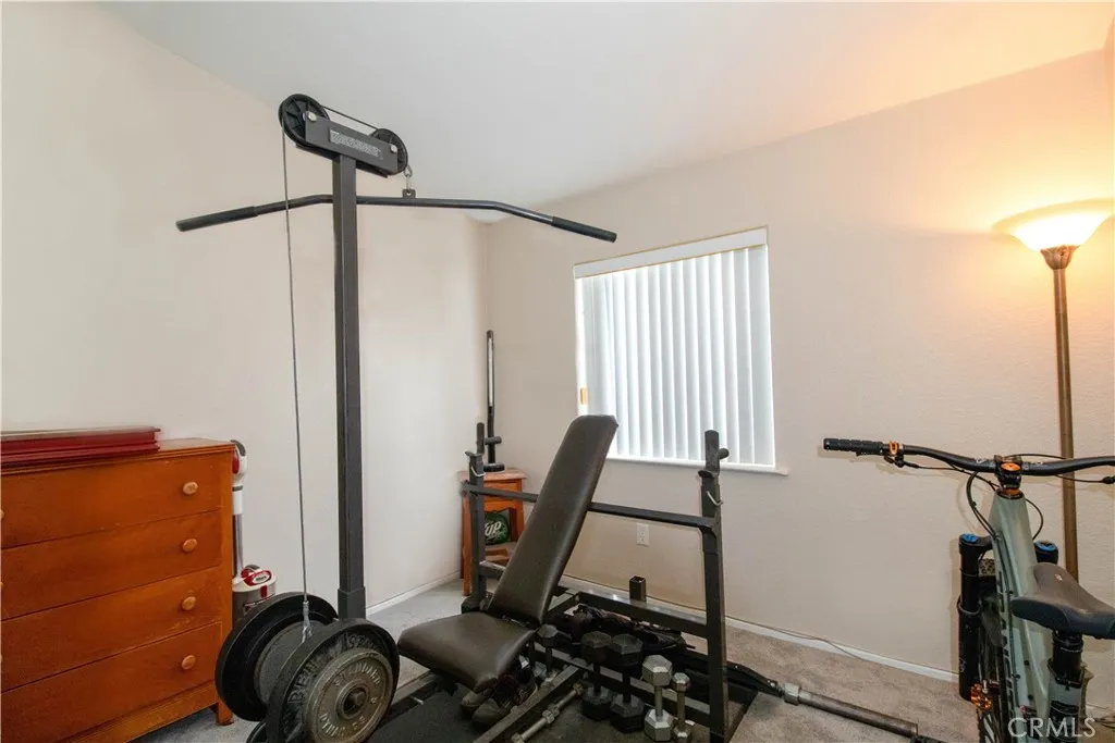 14352 Beach Westminster Ca, Unit 67 Westminster, CA 92683 - Photo 13 of 16 a room with furniture and wooden floor