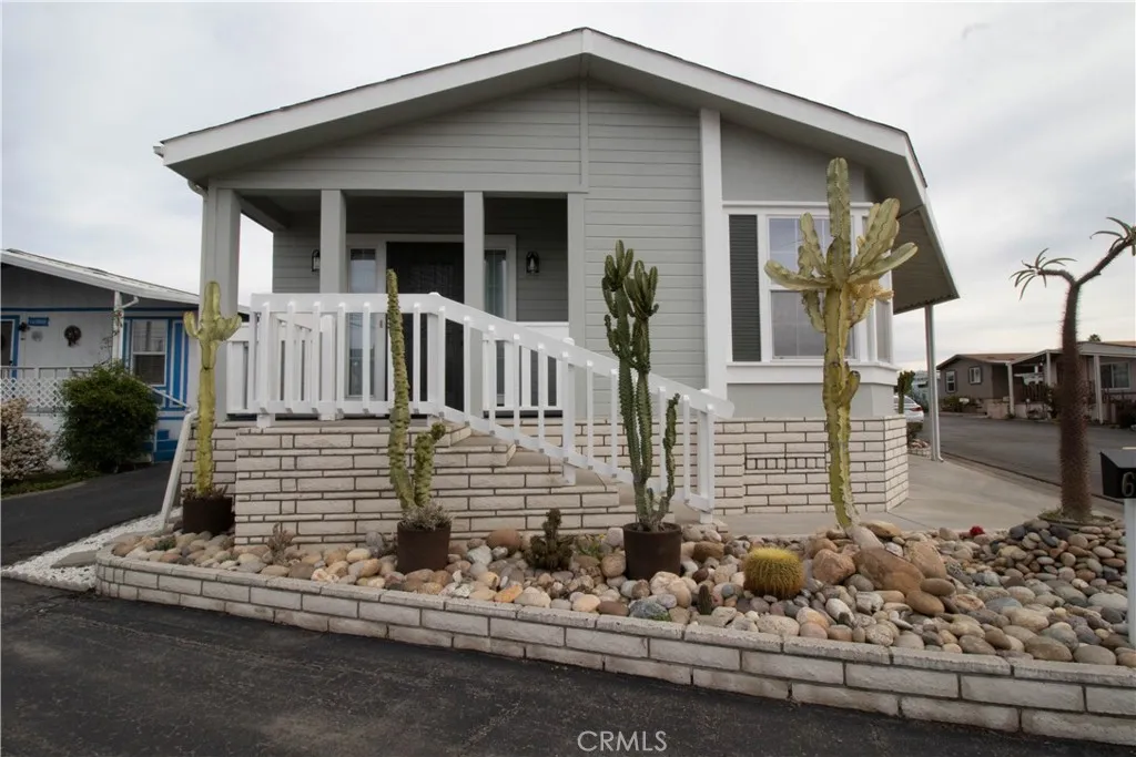 14352 Beach Westminster Ca, Unit 67 Westminster, CA 92683 - Photo 16 of 16 a front view of a house with a yard