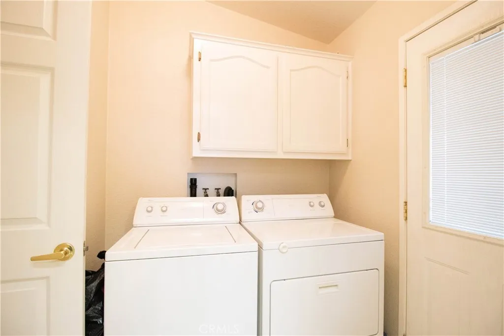 14352 Beach Westminster Ca, Unit 67 Westminster, CA 92683 - Photo 6 of 16 a utility room with dryer and washer