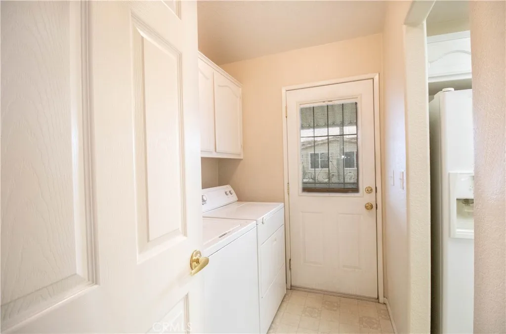 14352 Beach Westminster Ca, Unit 67 Westminster, CA 92683 - Photo 7 of 16 a utility room with dryer and washer