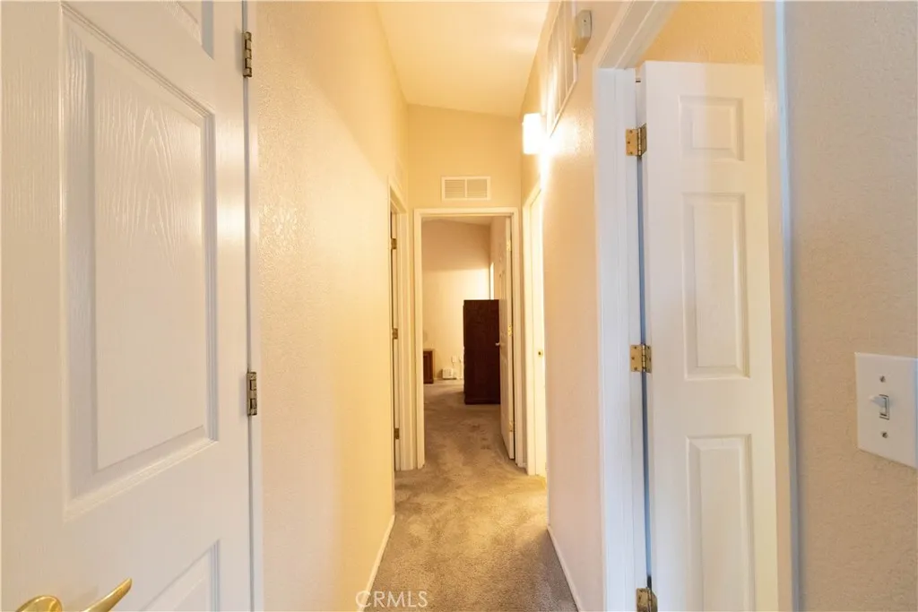 14352 Beach Westminster Ca, Unit 67 Westminster, CA 92683 - Photo 8 of 16 a view of a bathroom from a hallway