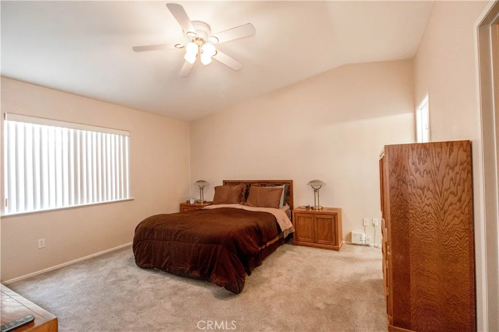 14352 Beach Westminster Ca, Unit 67 Westminster, CA 92683 - Photo 9 of 16 a bedroom with a bed dresser and a window