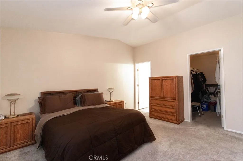 14352 Beach Westminster Ca, Unit 67 Westminster, CA 92683 - Photo 10 of 16 a bedroom with a bed and cabinets