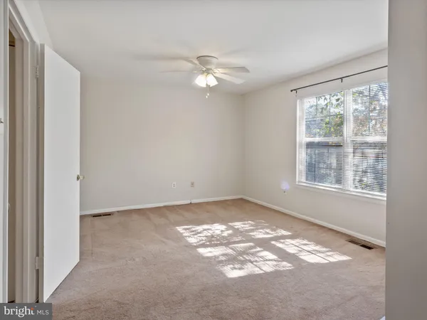 a view of a window in an empty room