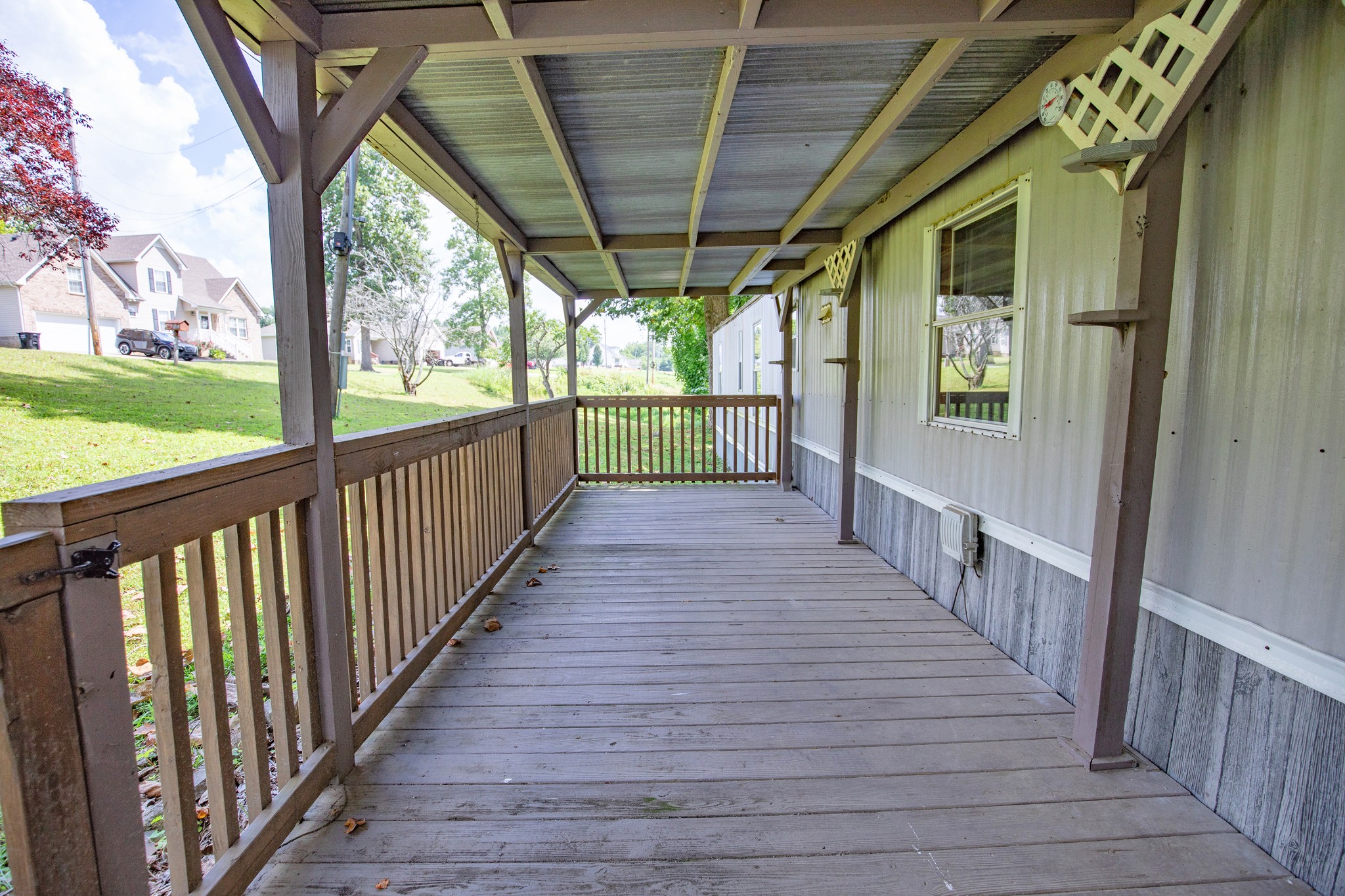 1304 Shell Road Goodlettsville, TN 37072 - Photo 20 of 40 a view of a porch with wooden floor and outdoor space