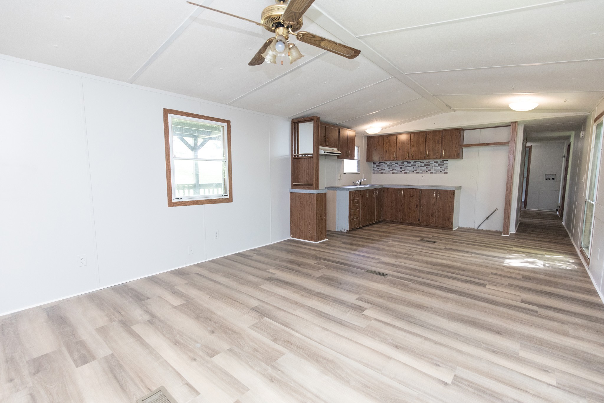 1304 Shell Road Goodlettsville, TN 37072 - Photo 2 of 40 a view of empty room with wooden floor and fan