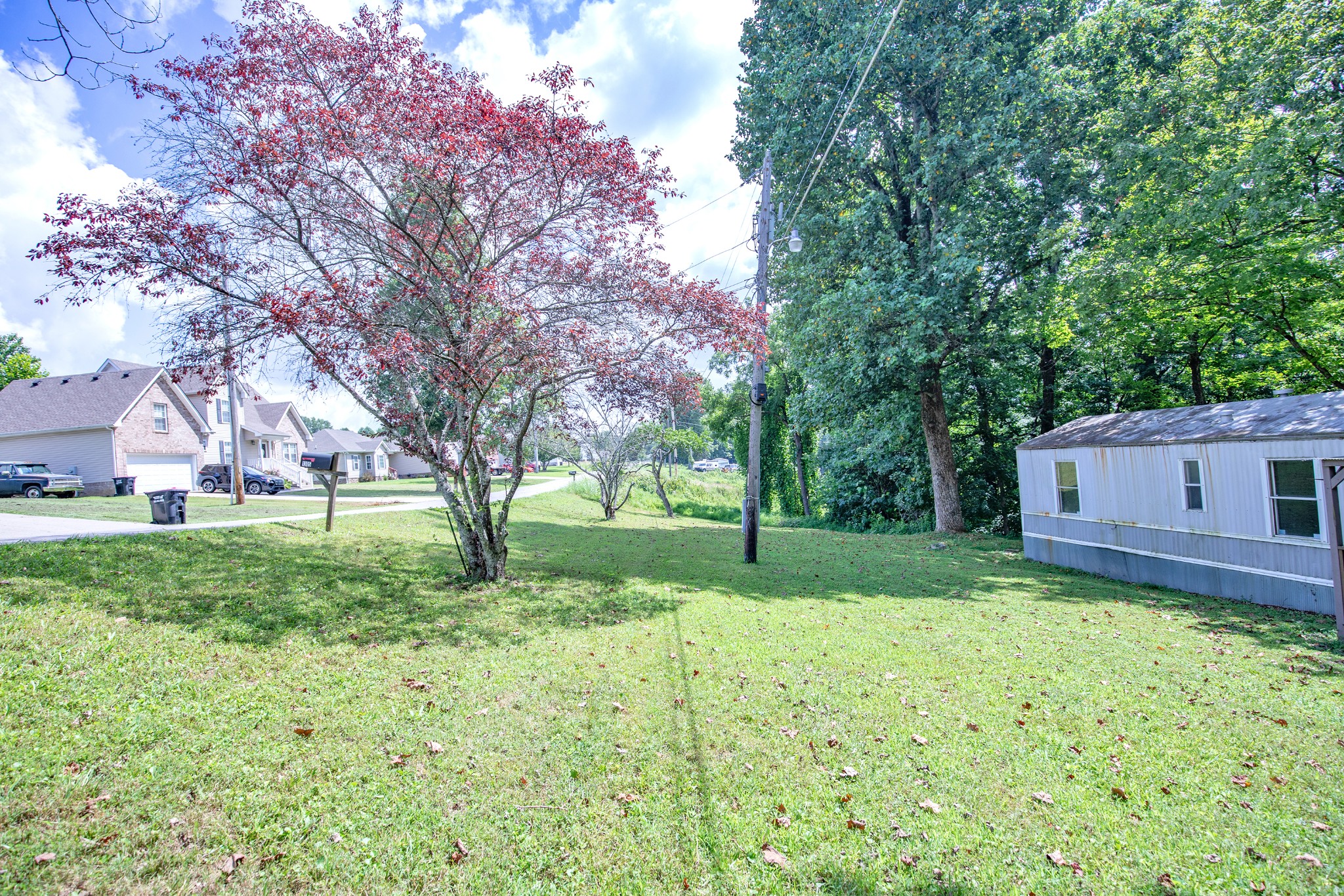 1304 Shell Road Goodlettsville, TN 37072 - Photo 29 of 40 a view of a backyard with large trees