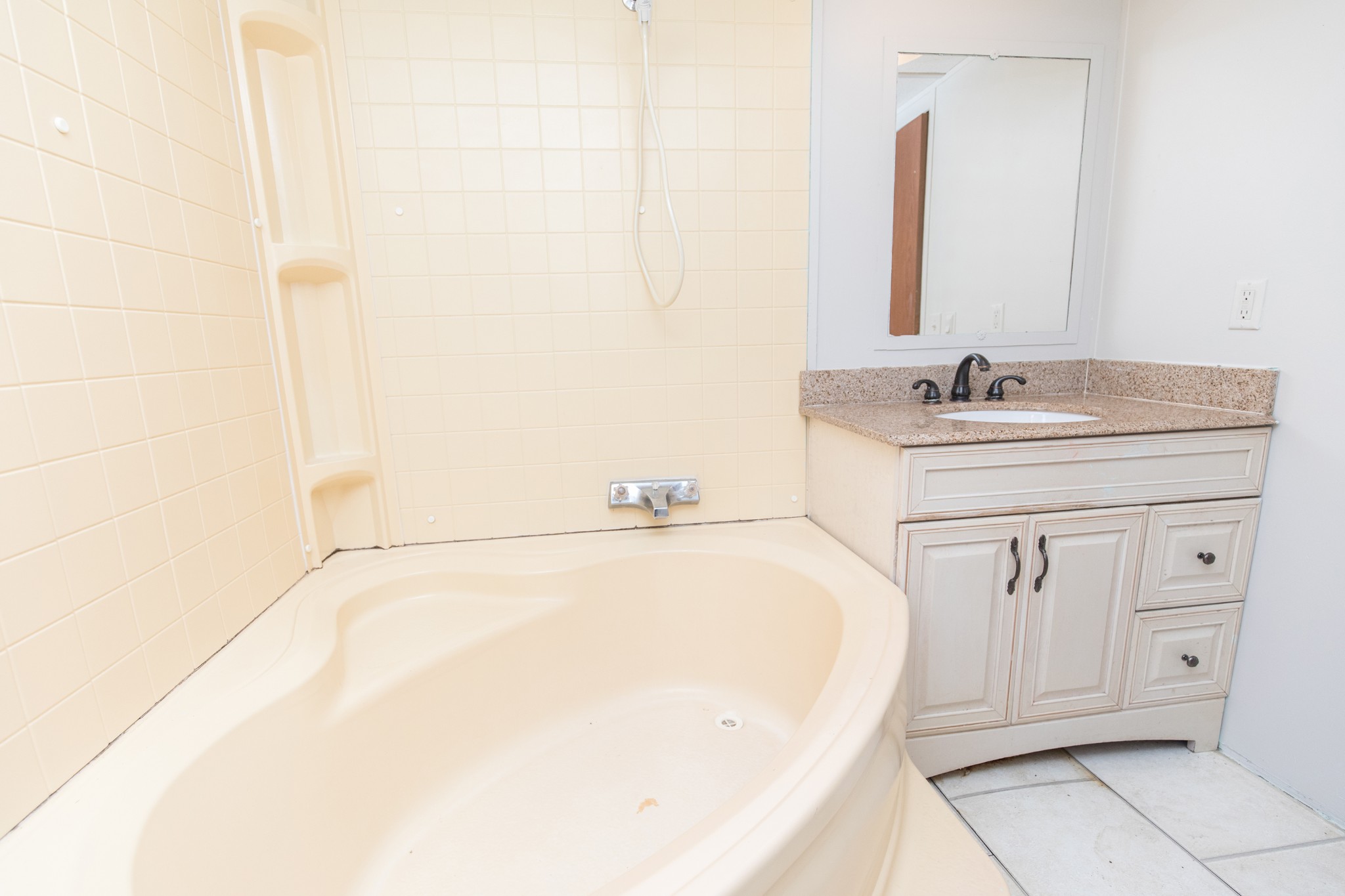 1304 Shell Road Goodlettsville, TN 37072 - Photo 9 of 40 a bathroom with a bathtub and a sink