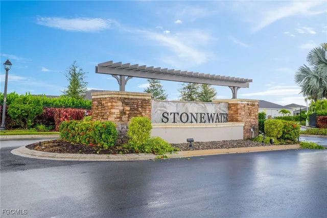 a view of a street with a sign board