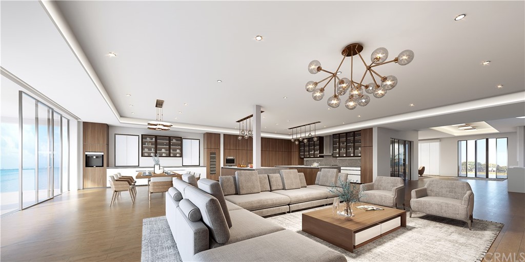 9 Seabreeze Terrace Dana Point, CA 92629 - Photo 13 of 34 a living room with furniture or kitchen view and a chandelier