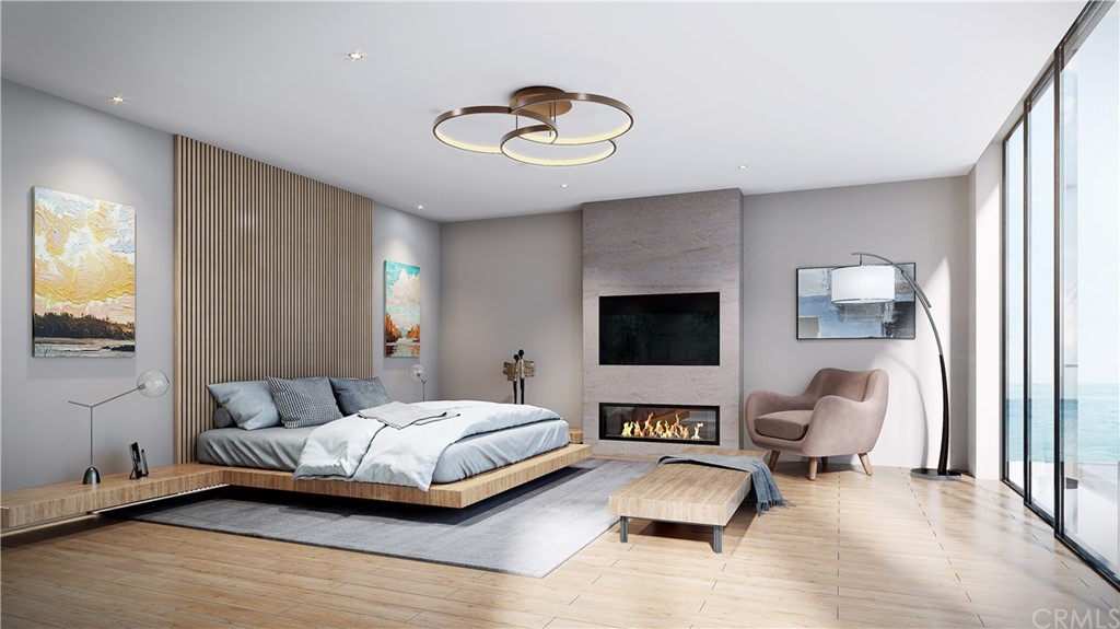 9 Seabreeze Terrace Dana Point, CA 92629 - Photo 16 of 34 a spacious bedroom with a bed and a couch