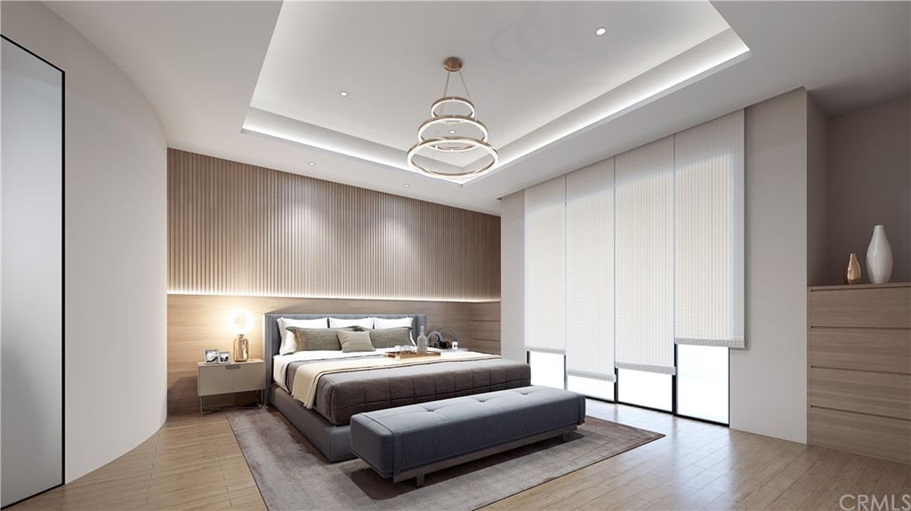 9 Seabreeze Terrace Dana Point, CA 92629 - Photo 19 of 34 a bedroom with a bed and wooden floor