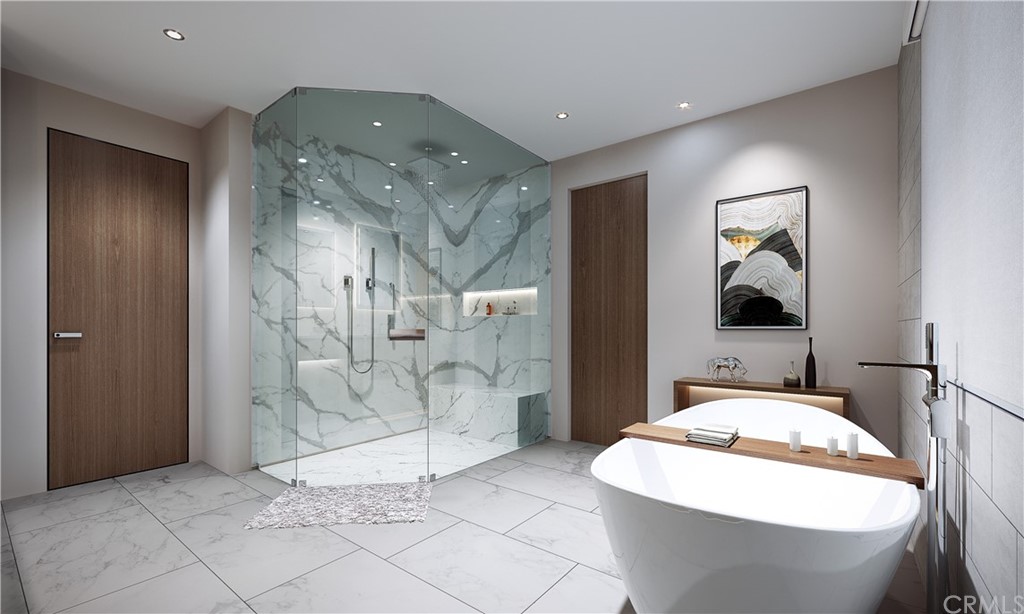 9 Seabreeze Terrace Dana Point, CA 92629 - Photo 20 of 34 a spacious bathroom with a granite countertop sink and a mirror