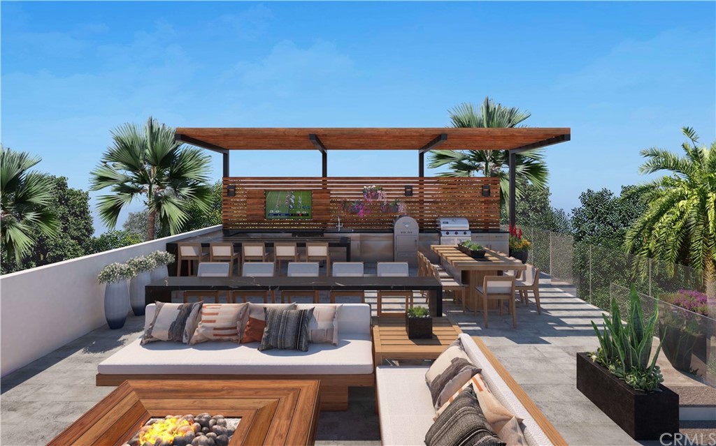 9 Seabreeze Terrace Dana Point, CA 92629 - Photo 6 of 34 a view of a roof deck with couches and potted plants