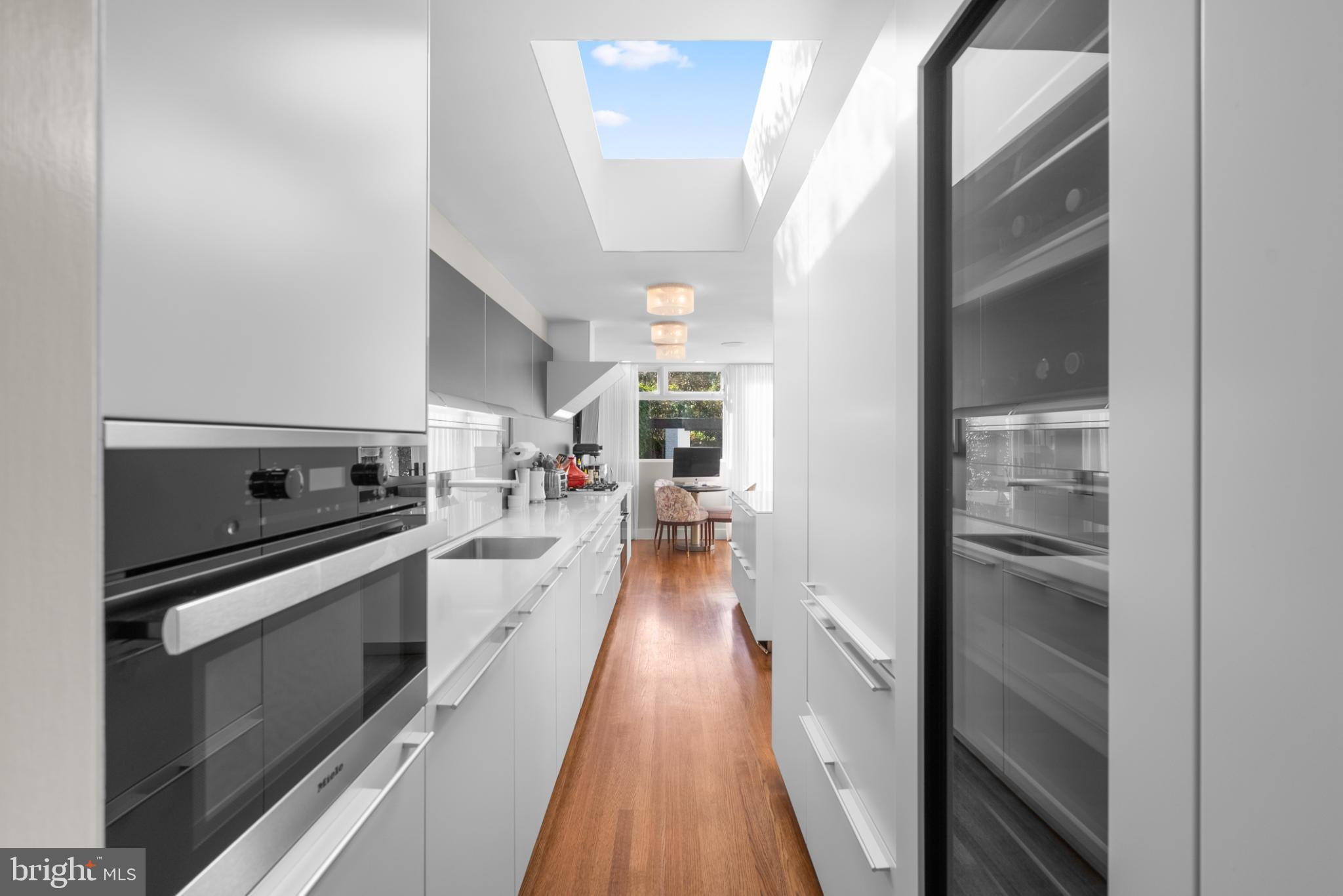 3322 Dent Place Northwest Washington, DC 20007 - Photo 12 of 41 a view of a kitchen with a stove top oven