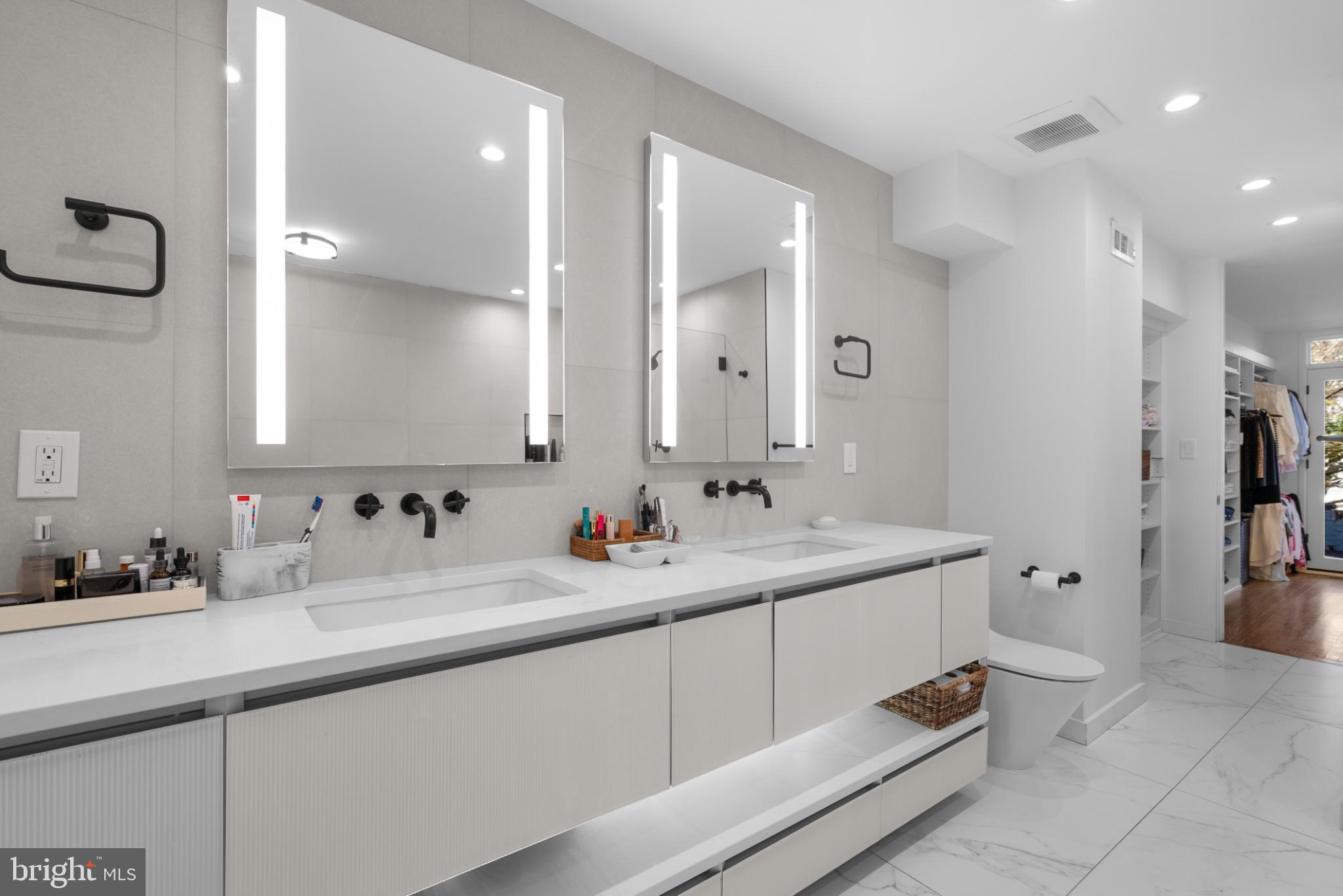 3322 Dent Place Northwest Washington, DC 20007 - Photo 26 of 41 a bathroom with a sink and mirror