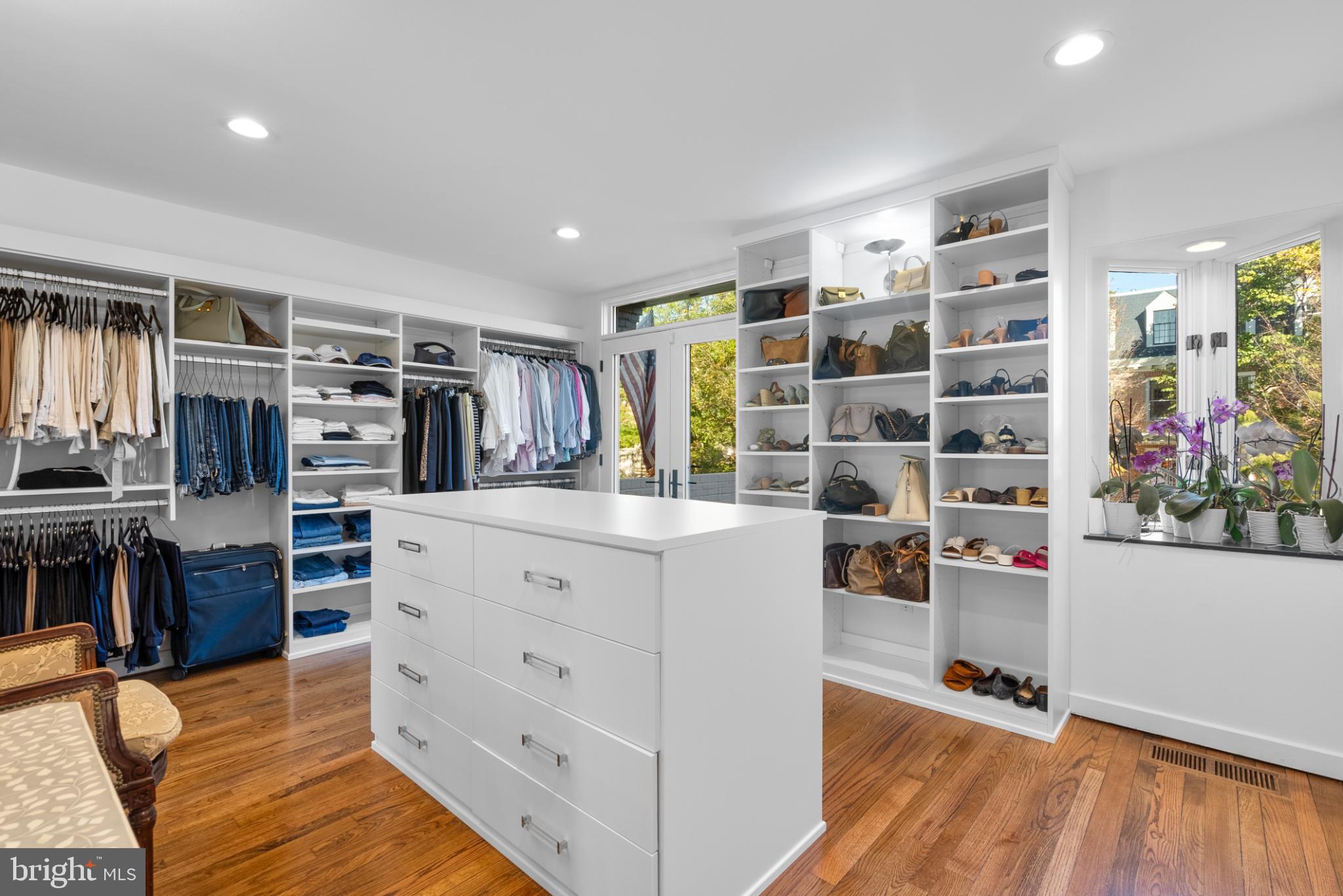 3322 Dent Place Northwest Washington, DC 20007 - Photo 28 of 41 a view of walk in closet with clothes and shoes