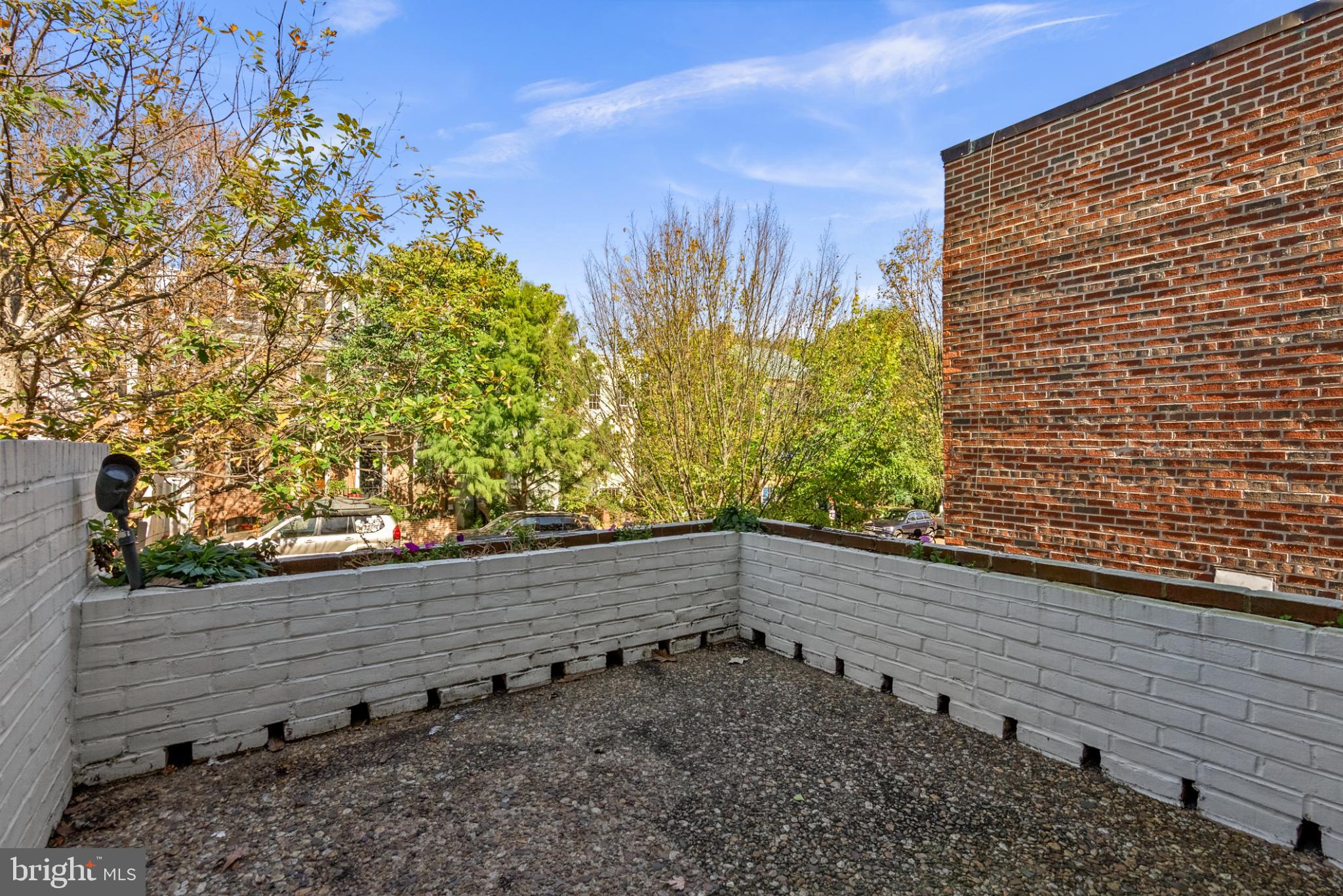 3322 Dent Place Northwest Washington, DC 20007 - Photo 30 of 41 a view of a yard with wooden fence