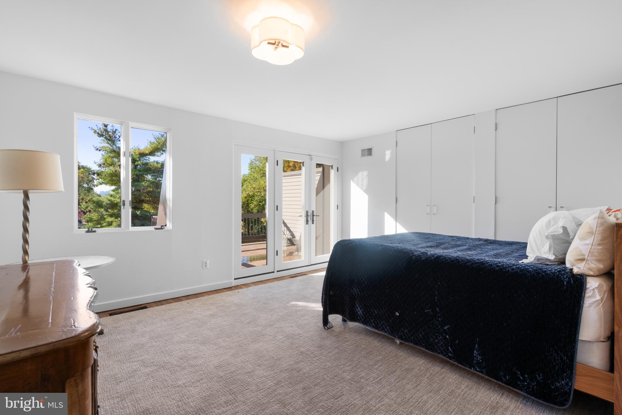 3322 Dent Place Northwest Washington, DC 20007 - Photo 32 of 41 a bedroom with a bed and a window