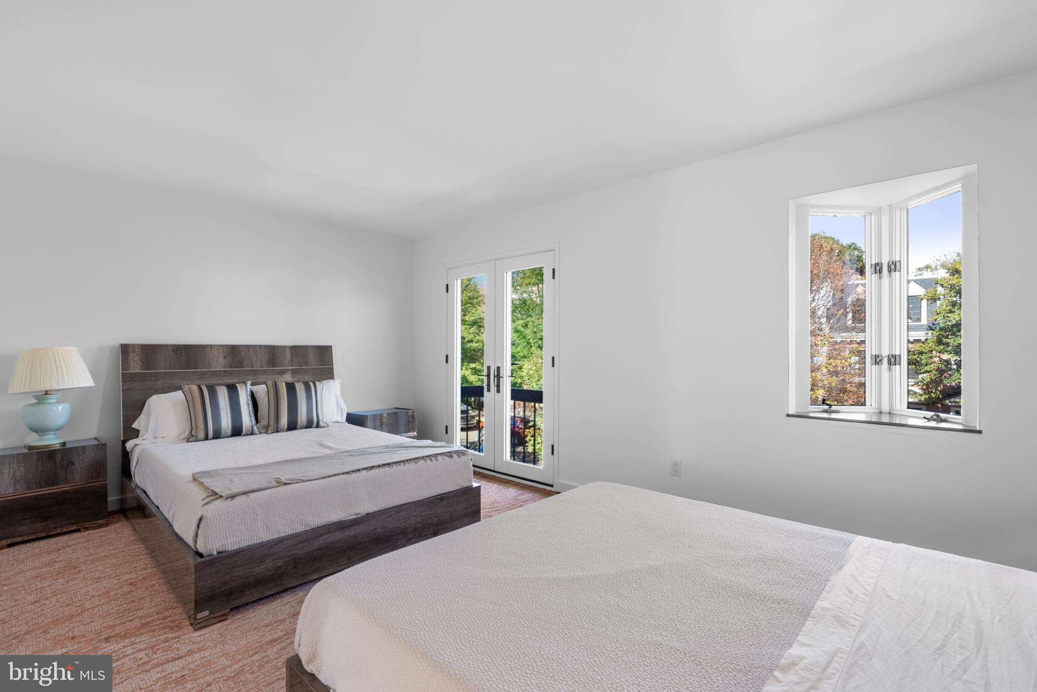 3322 Dent Place Northwest Washington, DC 20007 - Photo 34 of 41 a bedroom with two beds and a window