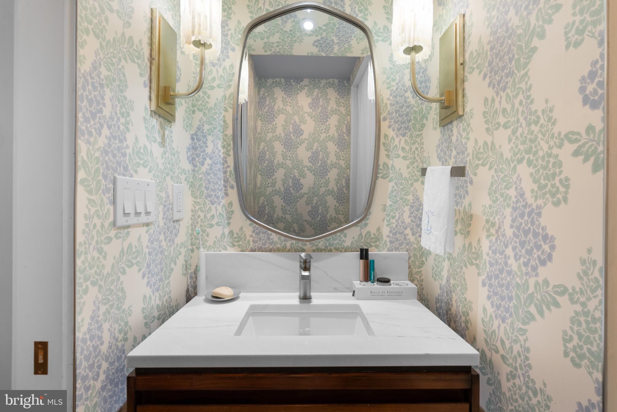 3322 Dent Place Northwest Washington, DC 20007 - Photo 5 of 41 a bathroom with a sink and a mirror