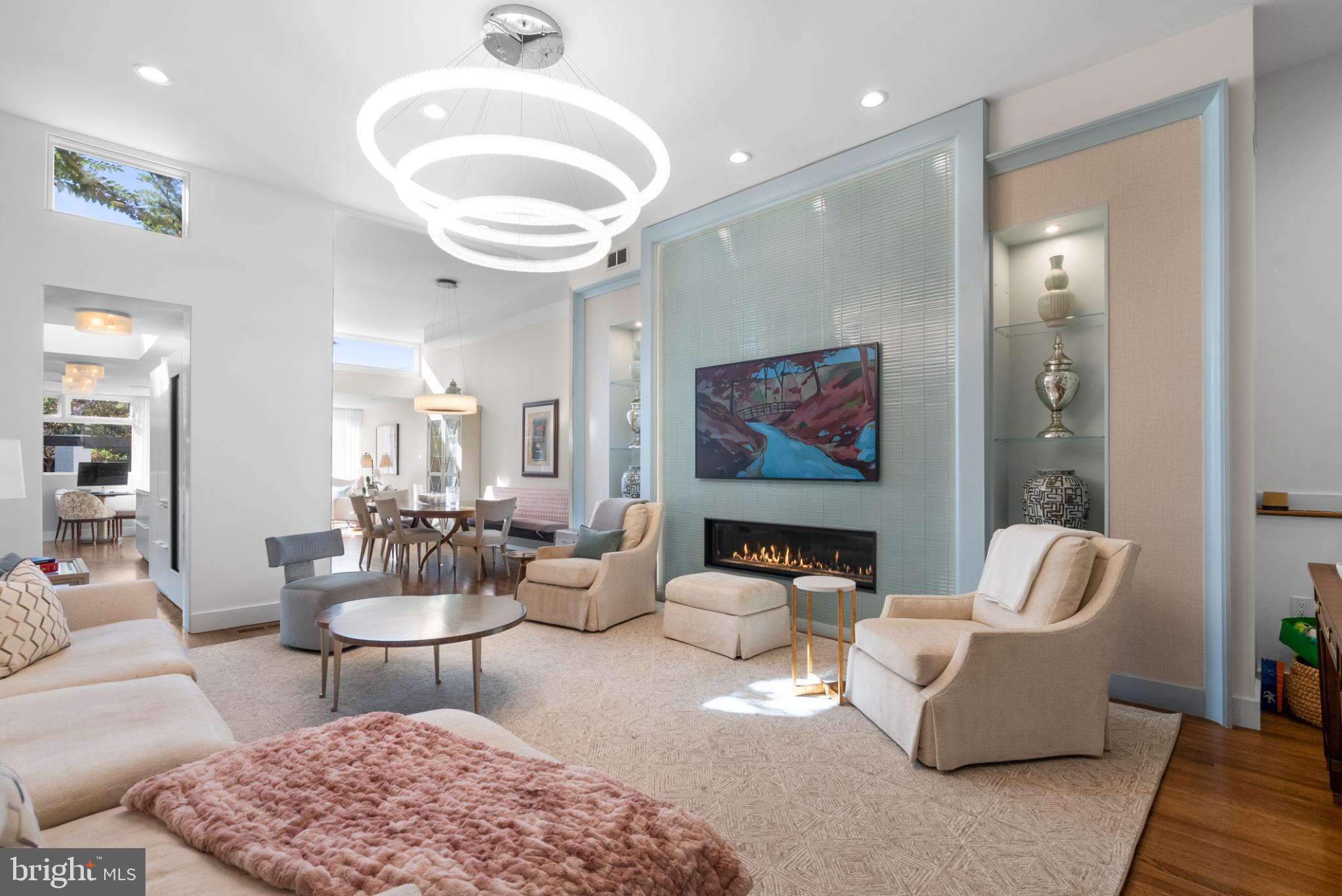 3322 Dent Place Northwest Washington, DC 20007 - Photo 6 of 41 a living room with furniture and a large mirror
