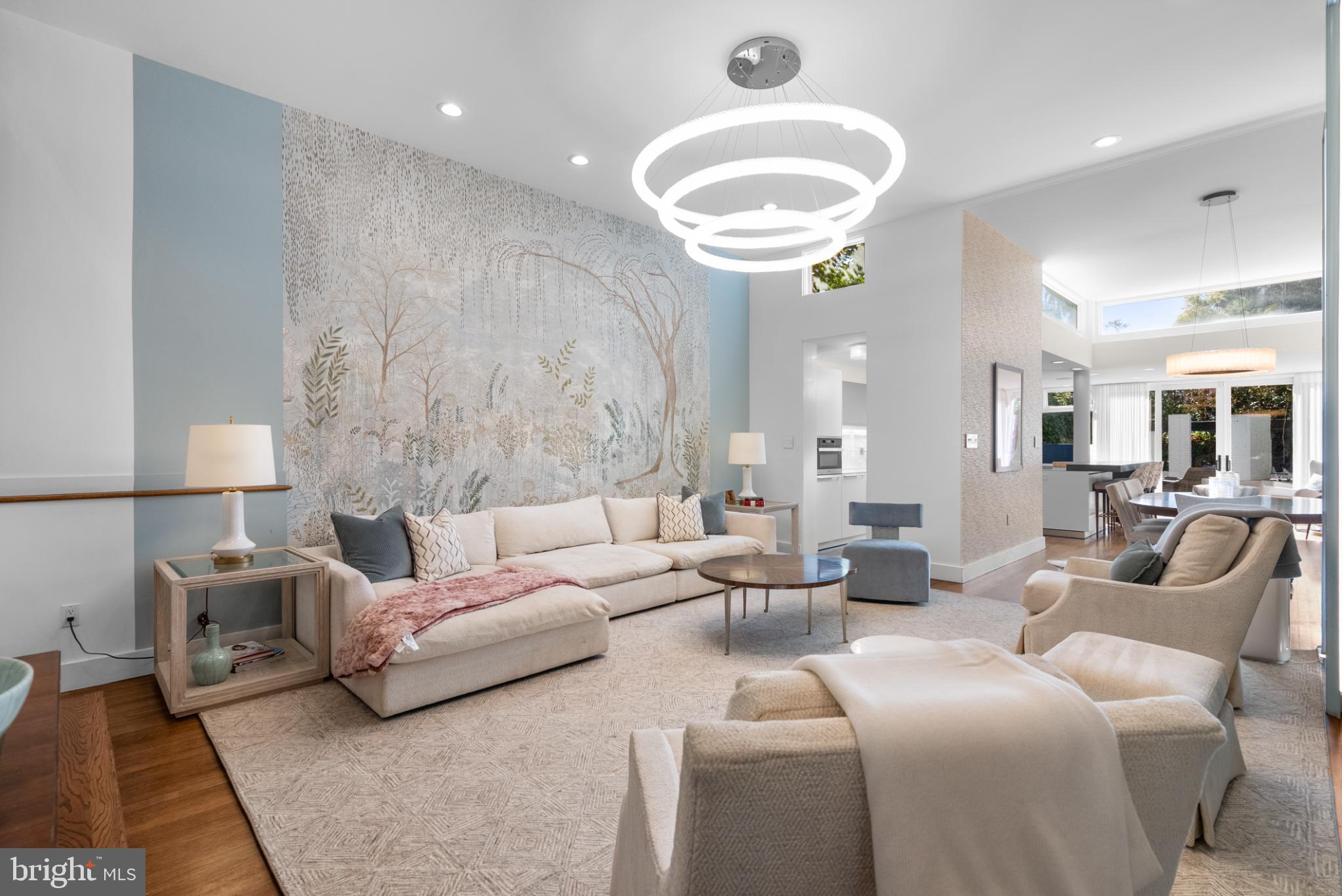 3322 Dent Place Northwest Washington, DC 20007 - Photo 7 of 41 a living room with furniture and a chandelier