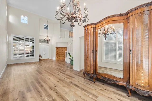 a view of entryway with wooden floor