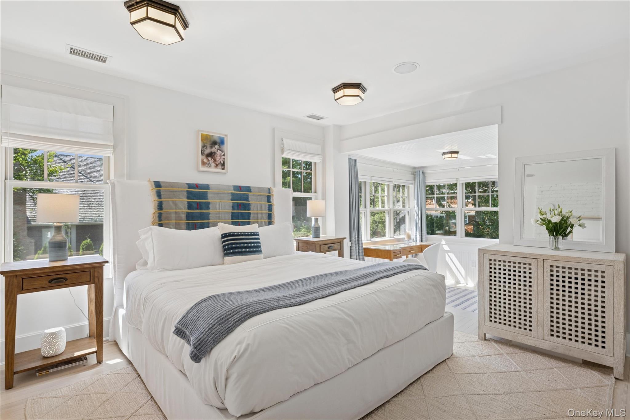51 Sherrill Road East Hampton, NY 11937 - Photo 17 of 35 a bedroom with a large bed and a window