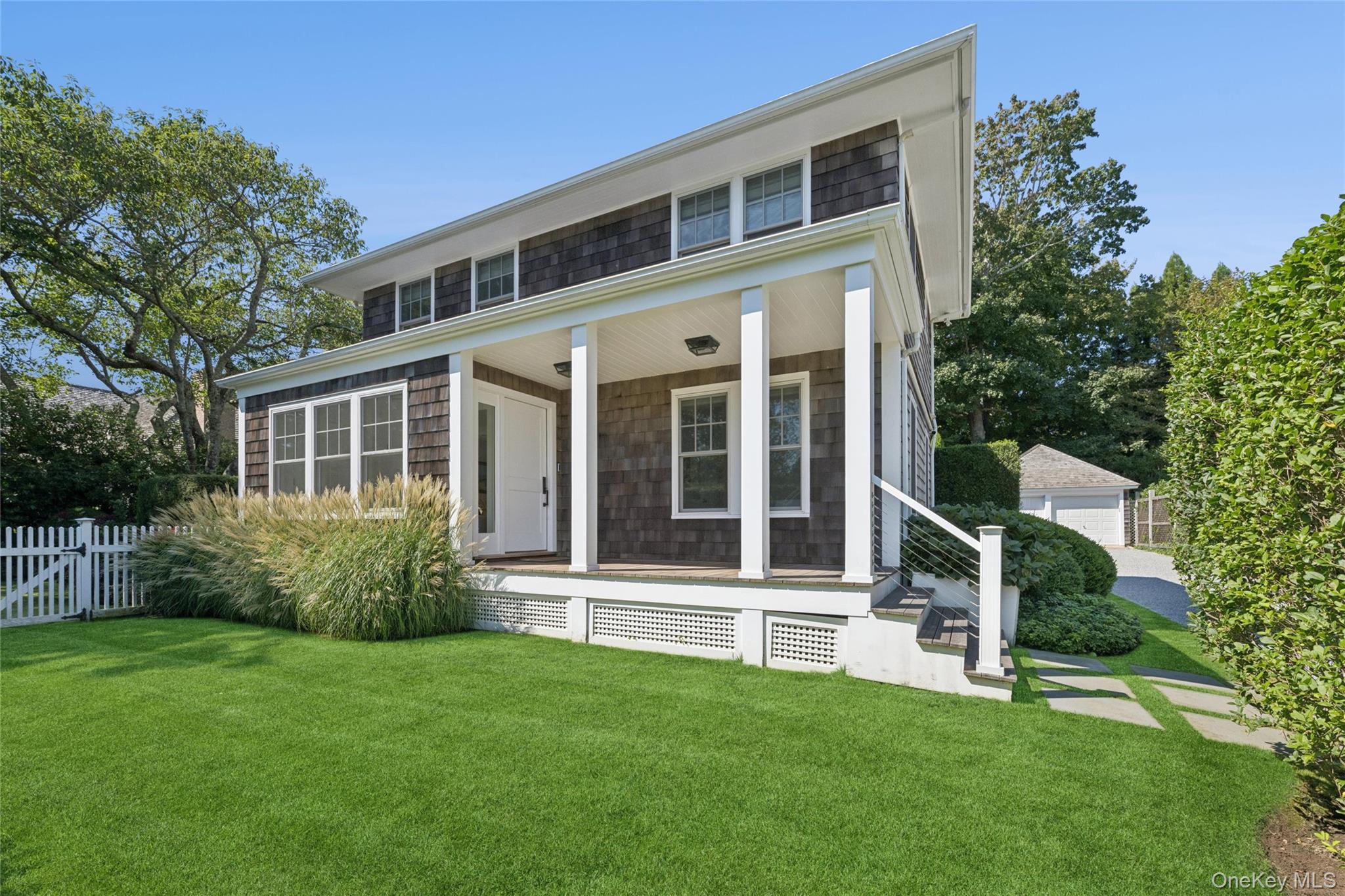 51 Sherrill Road East Hampton, NY 11937 - Photo 2 of 35 front view of a house with a yard