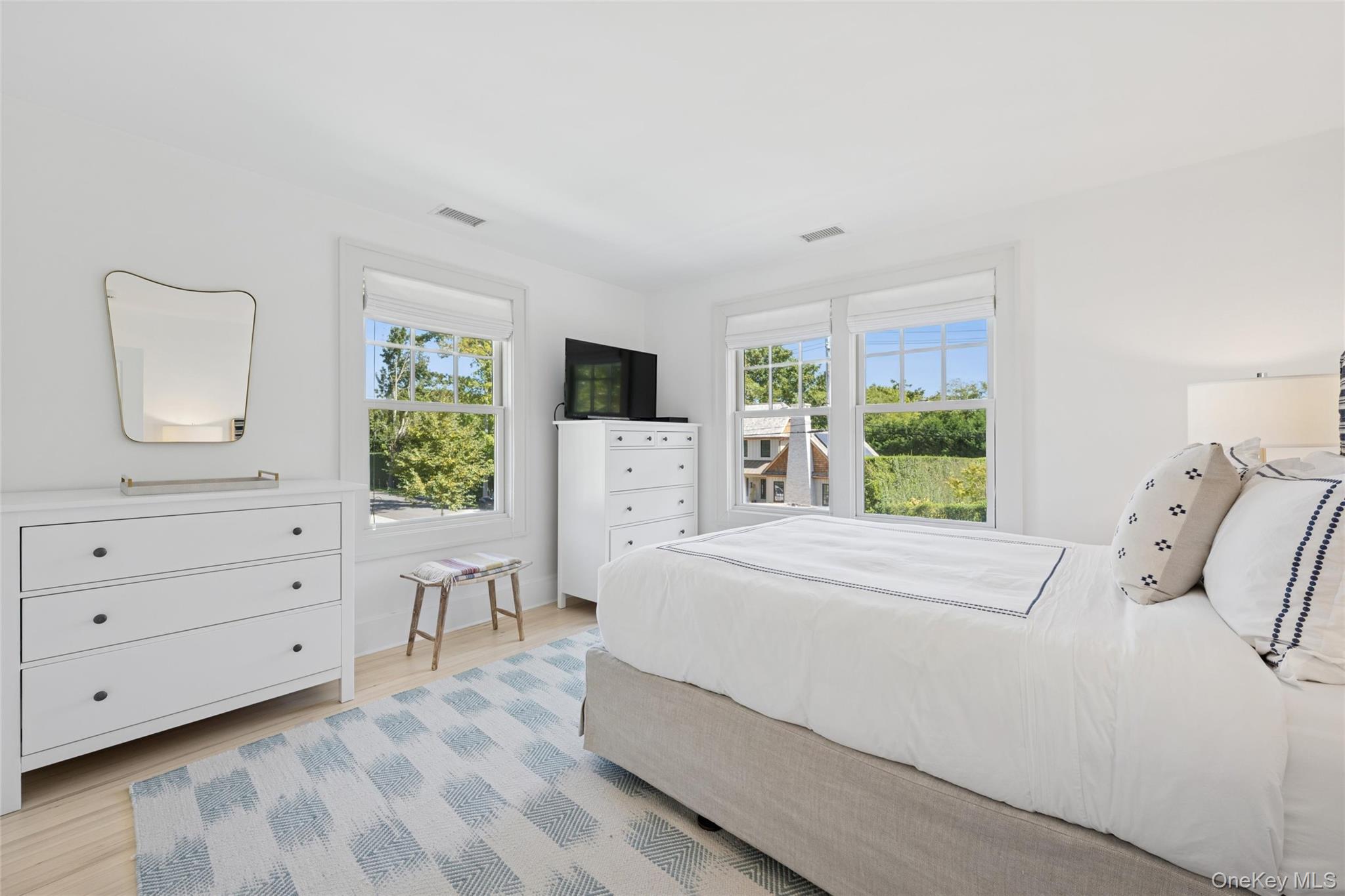 51 Sherrill Road East Hampton, NY 11937 - Photo 25 of 35 a bed room with a bed and a window