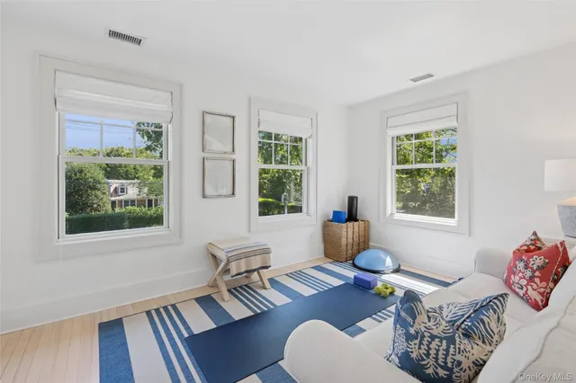 a living room with furniture and window