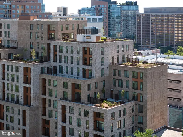 a view of a city with tall buildings