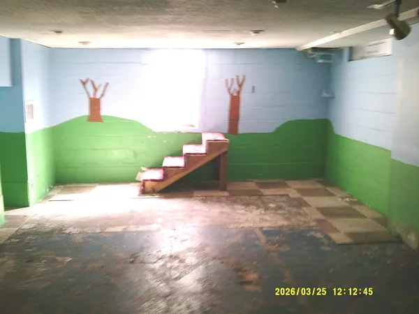 a view of a room with a fireplace