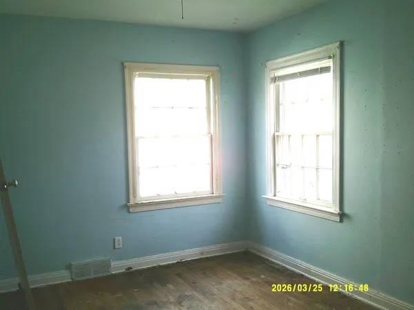 an empty room with a window