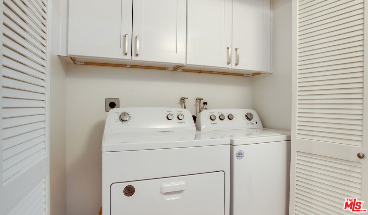 1420 Peerless Place, Unit 213 Los Angeles, CA 90035 - Photo 5 of 10 a utility room with dryer and washer