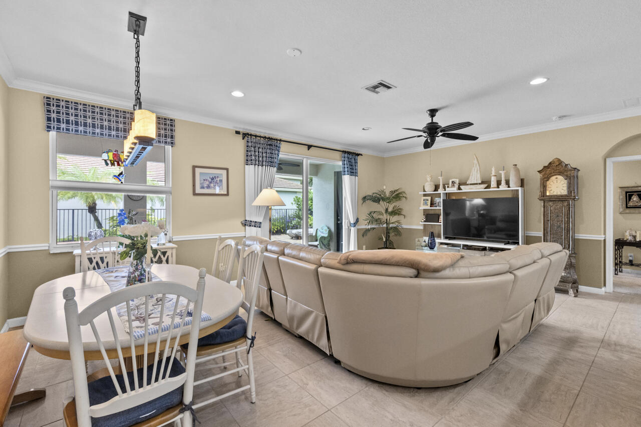 2190 Northwest Dalea Way Stuart, FL 34994 - Photo 14 of 31 a living room with furniture and a flat screen tv