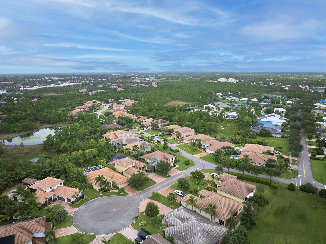 2190 Northwest Dalea Way Stuart, FL 34994 - Photo 27 of 31 an aerial view of residential houses with outdoor space