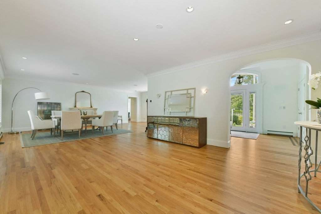 1460 South County Road Barnstable, MA 02655 - Photo 11 of 40 a living room with furniture and a wooden floor