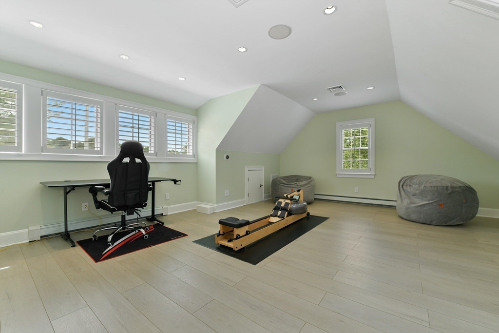 1460 South County Road Barnstable, MA 02655 - Photo 24 of 40 a living room with furniture gym equipment and a window