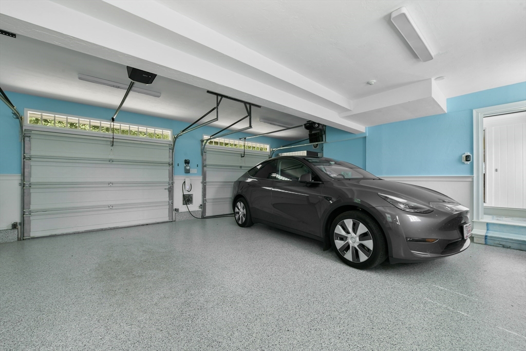 1460 South County Road Barnstable, MA 02655 - Photo 39 of 40 a car parked in a garage