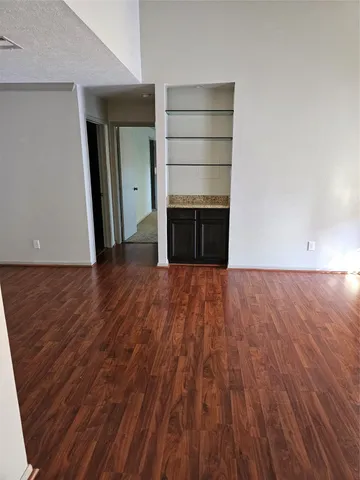 a view of a room with storage and utility room