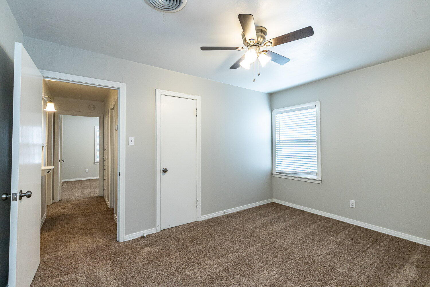 2603 39th Street Lubbock, TX 79413 - Photo 12 of 19 a view of an empty room with a window