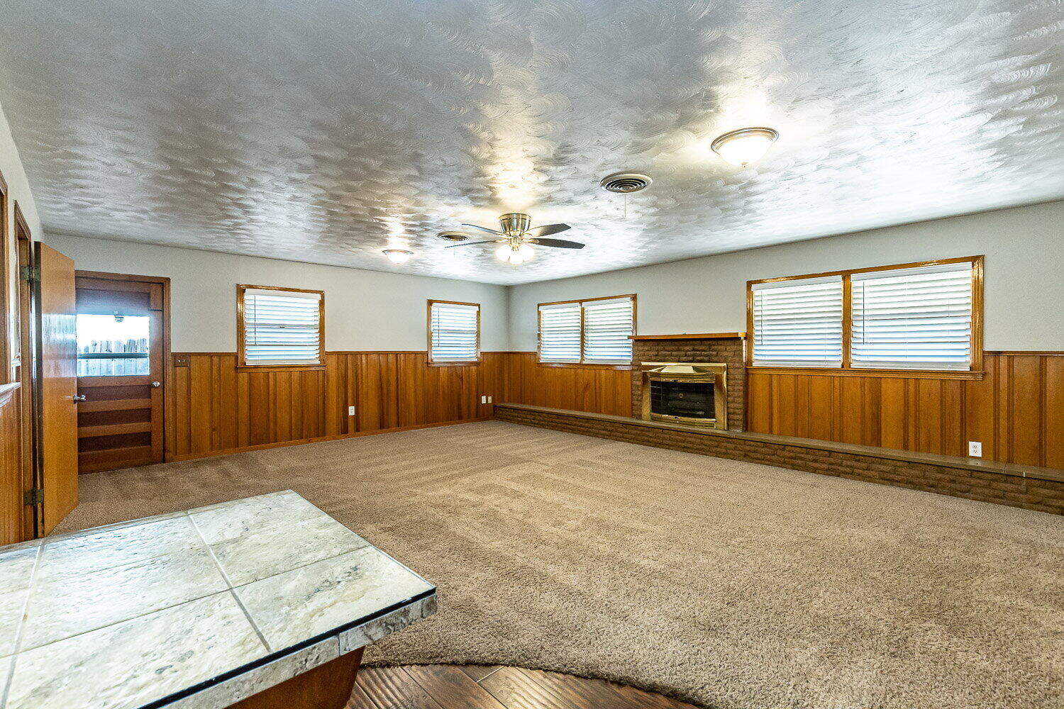 2603 39th Street Lubbock, TX 79413 - Photo 6 of 19 a view of a livingroom with furniture and windows
