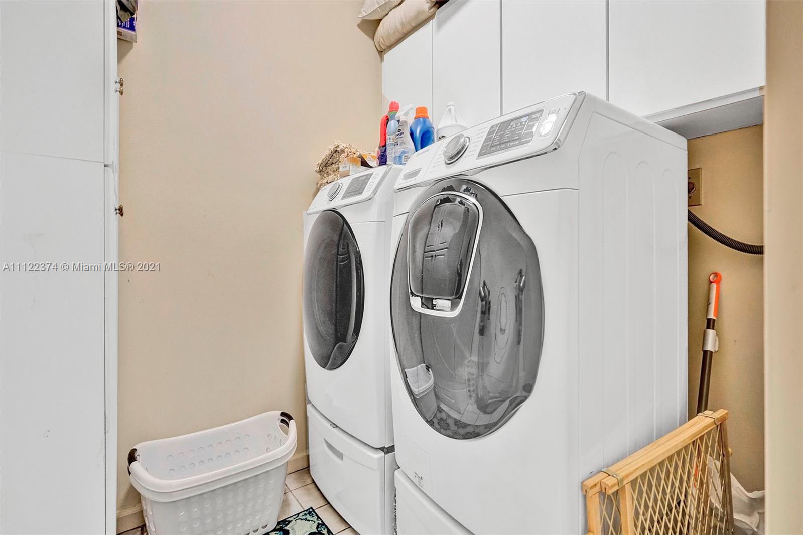 19609 Sedgefield Terrace Boca Raton, FL 33498 - Photo 36 of 43 a utility room with dryer and washer