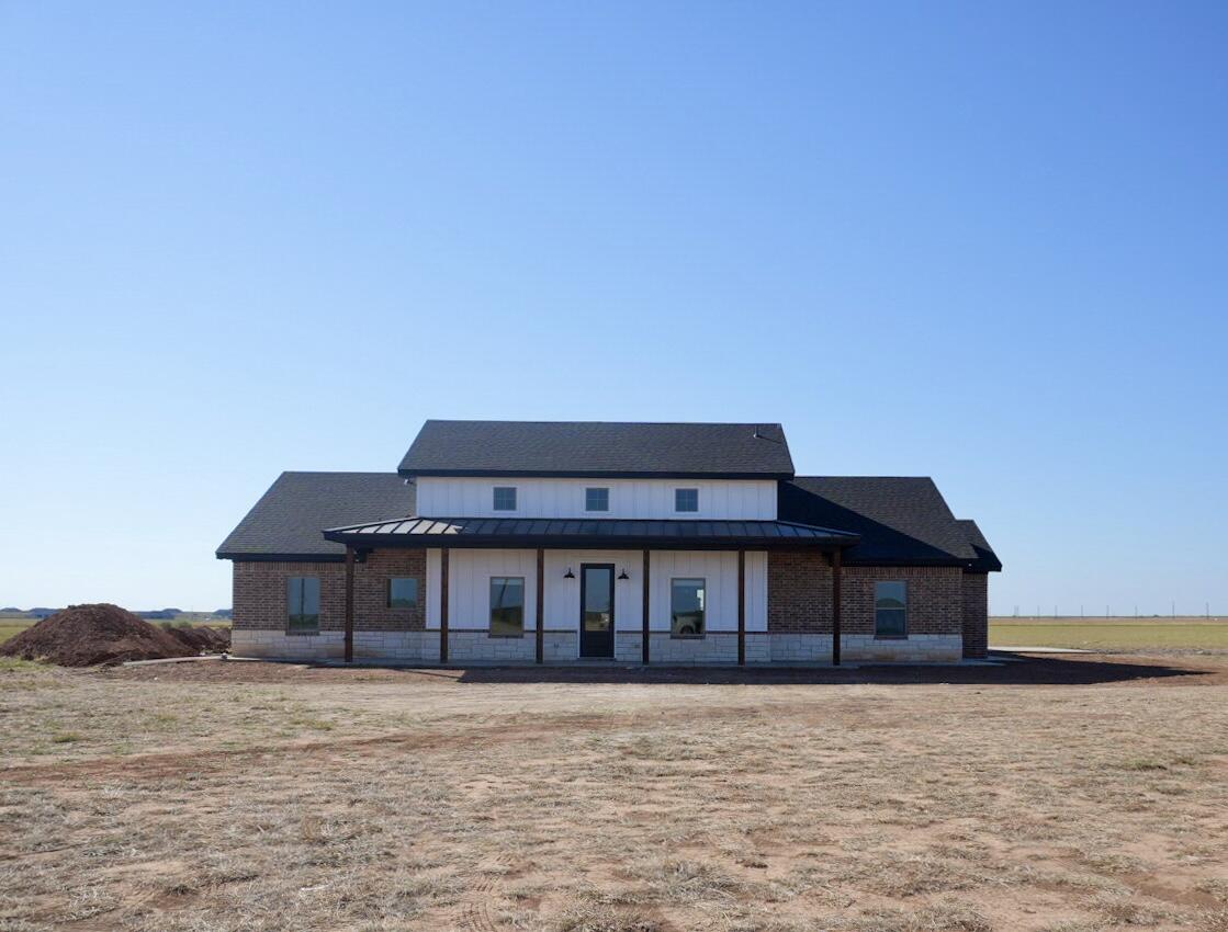 4301 Co Road Lubbock, TX 79424 - Photo 1 of 1 a front view of a house with a yard